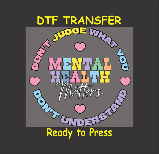 DTF transfer with pastel Mental Health Matters text and message about not judging what you don’t understand.