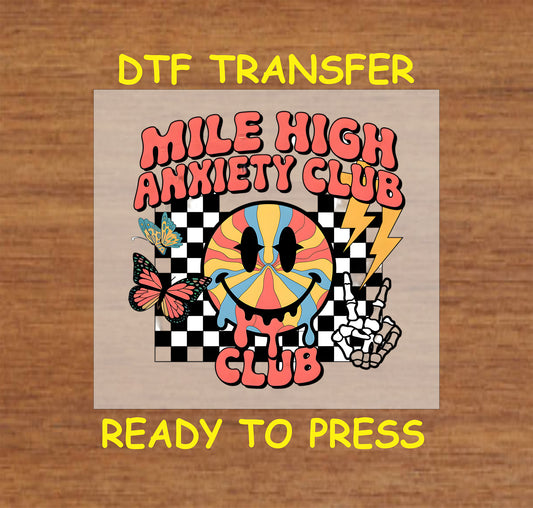 DTF transfer with melting smiley face, checkered background, peace sign skeleton hand, and text Mile High Anxiety Club.