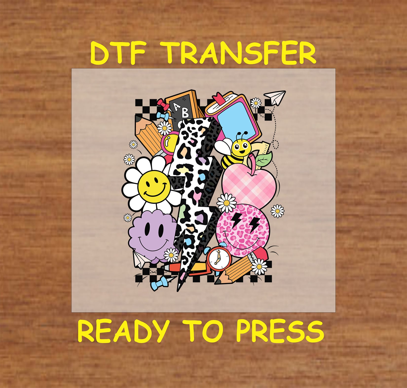 Colorful classroom-themed DTF transfer with smiley face, flowers, books, and lightning bolt.
