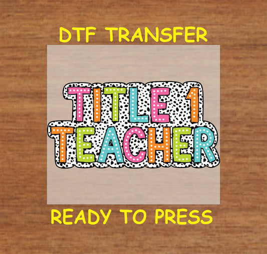 Title 1 teacher DTF transfer with colorful block letters and black and white polka dot border.
