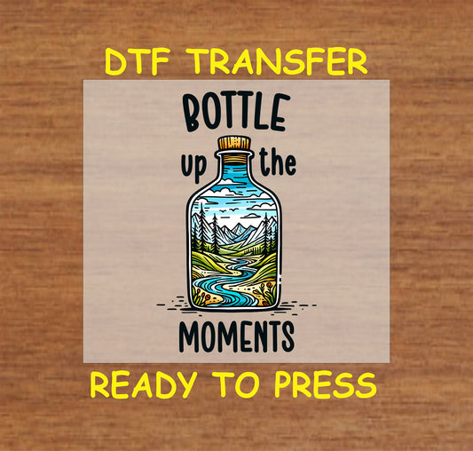 Bottle up the moments DTF transfer with river, pine trees, and mountain scene inside a bottle.