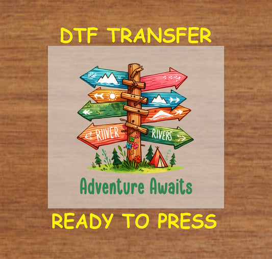 Adventure Awaits DTF transfer with colorful signpost, arrows, trees, and tent scene.