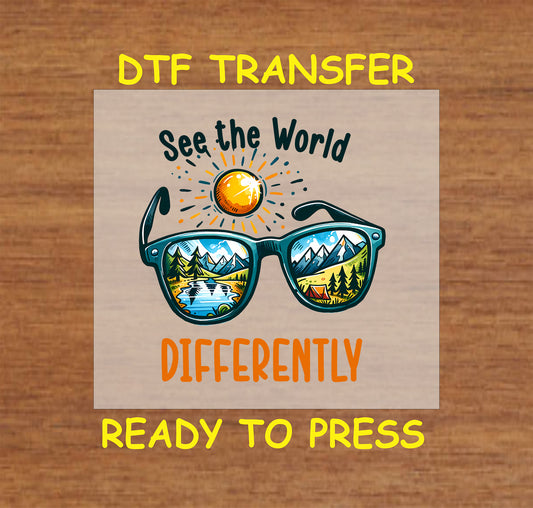 See the World Differently DTF transfer with sunglasses reflecting forest and mountain scenery.