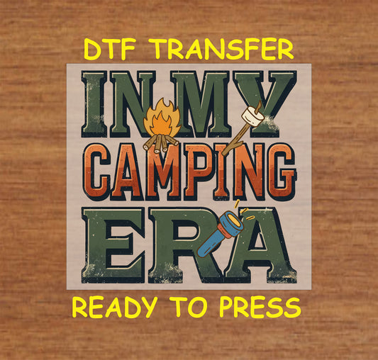 DTF transfer that says In My Camping Era with campfire, marshmallows, and flashlight