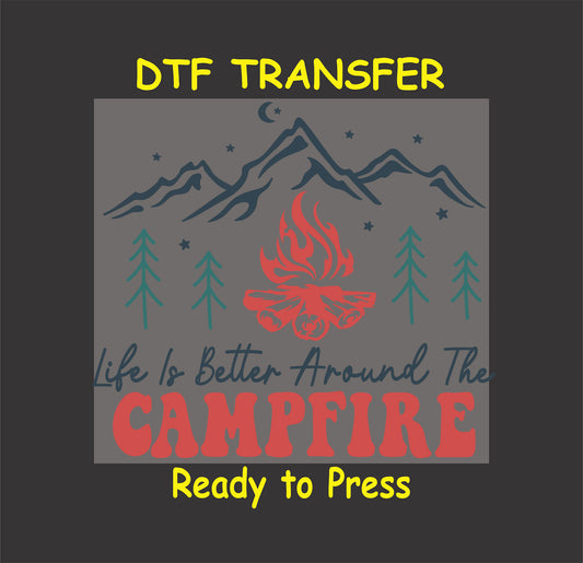 DTF transfer with campfire, pine trees, mountain range, stars, and camp quote