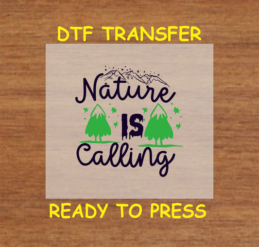 DTF transfer with Nature Is Calling text, green pine trees, and black mountain line art