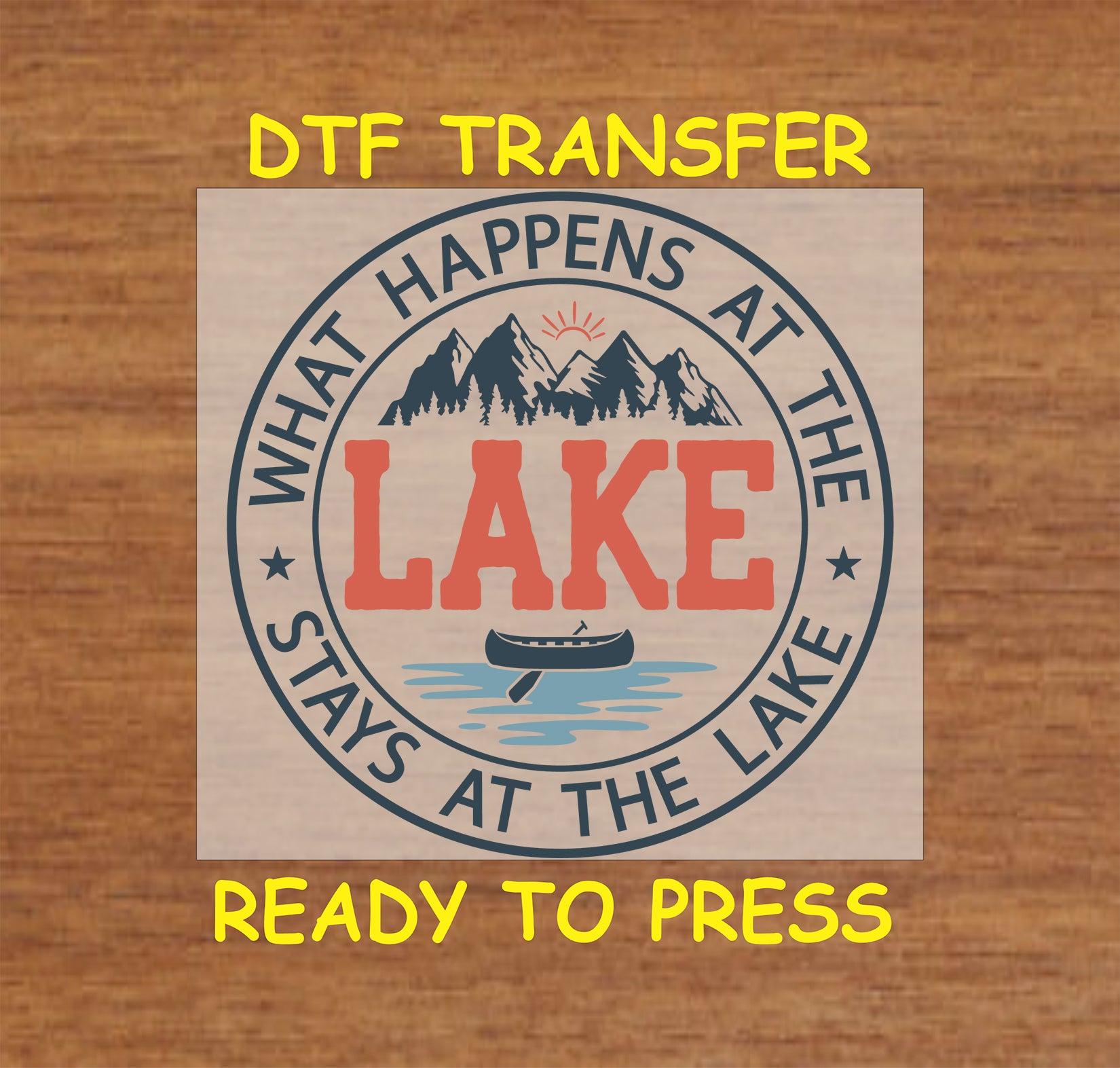 DTF transfer with What Happens at the Lake quote, canoe, water, sun, and mountain artwork.