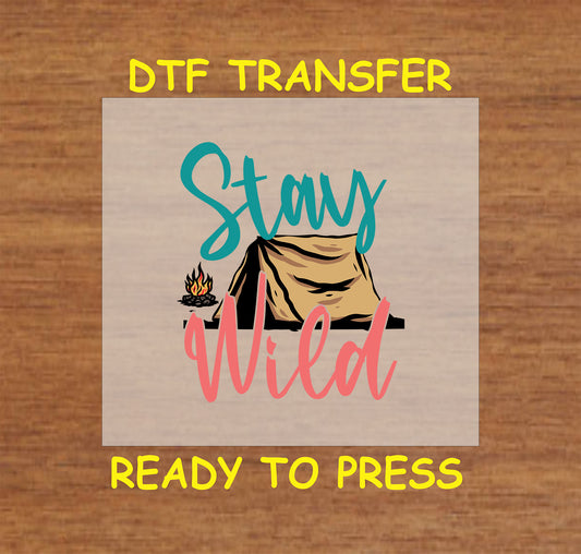 Stay Wild DTF transfer with tent and campfire in teal and coral lettering.