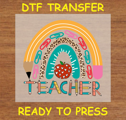 "Teacher DTF Transfer with a rainbow design made of pencils, paper clips, and leopard print"