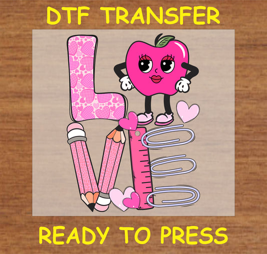 "LOVE Teacher DTF Transfer with a pink apple and school-themed design for teacher gifts and custom apparel"