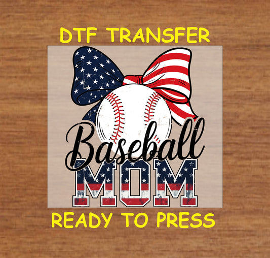 Baseball Mom DTF transfer with red white blue bow and stars and stripes lettering.