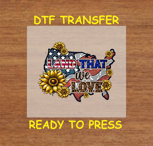USA map with red white blue stars, sunflowers, and text Land That We Love, DTF transfer.