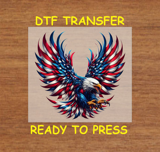 Bald eagle flying with wide wings in red white blue feathers and stars, patriotic DTF transfer.
