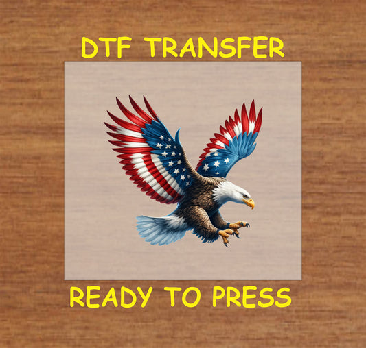 Bald eagle in attack pose with American flag wings spread wide for 4th of July DTF transfer.