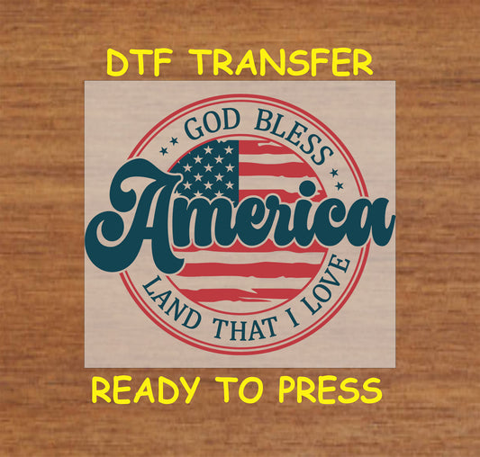 Clean circular DTF transfer with God Bless America and American flag in red and blue.