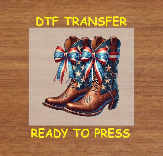 Brown cowgirl boots with patriotic bows and stars.