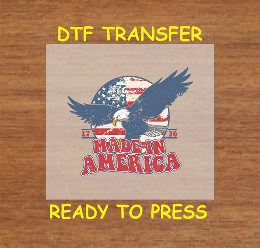 Flying eagle with American flag and Made in America text.