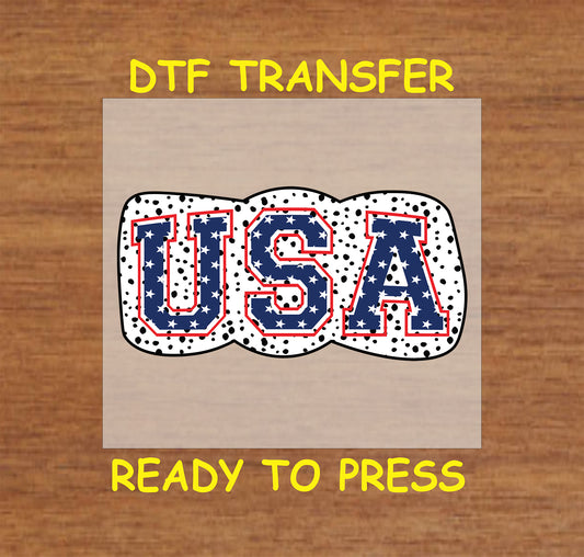 USA letters with white stars on navy and black polka dot bow DTF transfer.