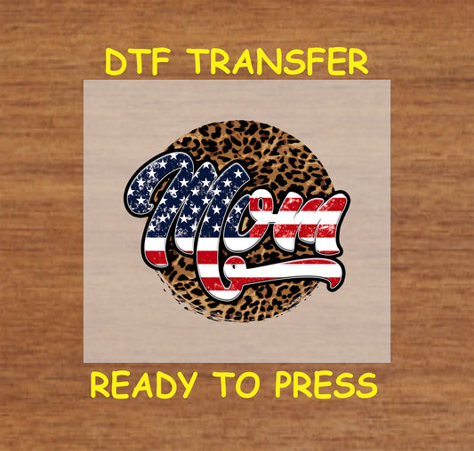 DTF transfer with USA flag “Mom” text layered over a leopard print circle background.