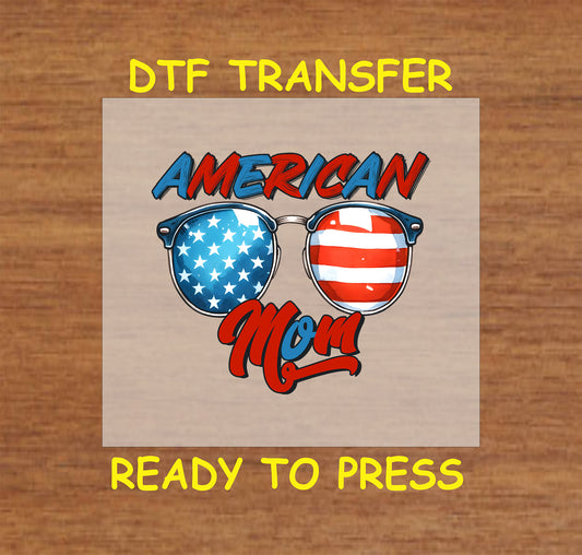 DTF transfer with American Mom text and patriotic sunglasses with flag reflection.