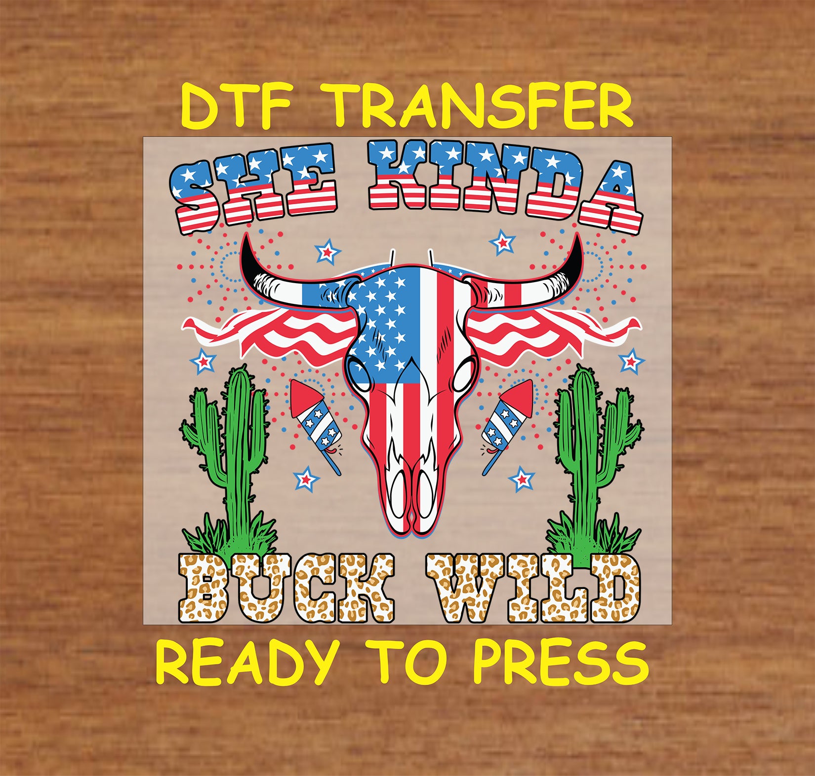 DTF transfer with patriotic cow skull, fireworks, stars, cacti, and She Kinda Buck Wild text.