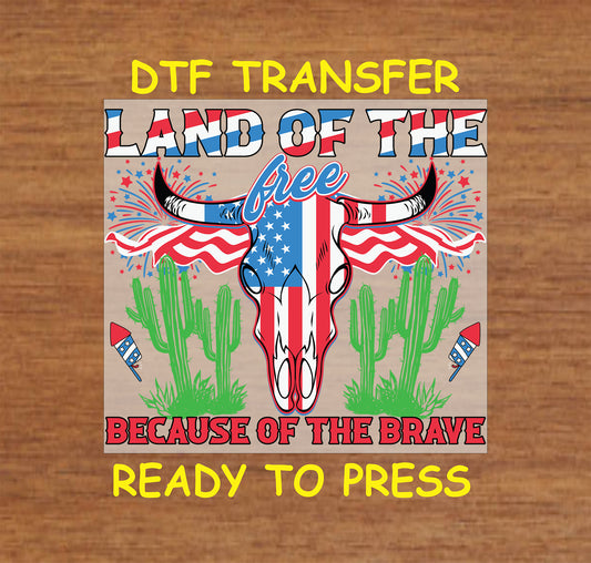 DTF transfer with patriotic skull, flags, cacti, fireworks, and Land of the Free text.