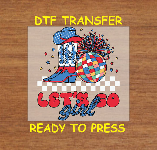 DTF transfer with patriotic cowgirl boots, disco ball, and Let’s Go Girl text.