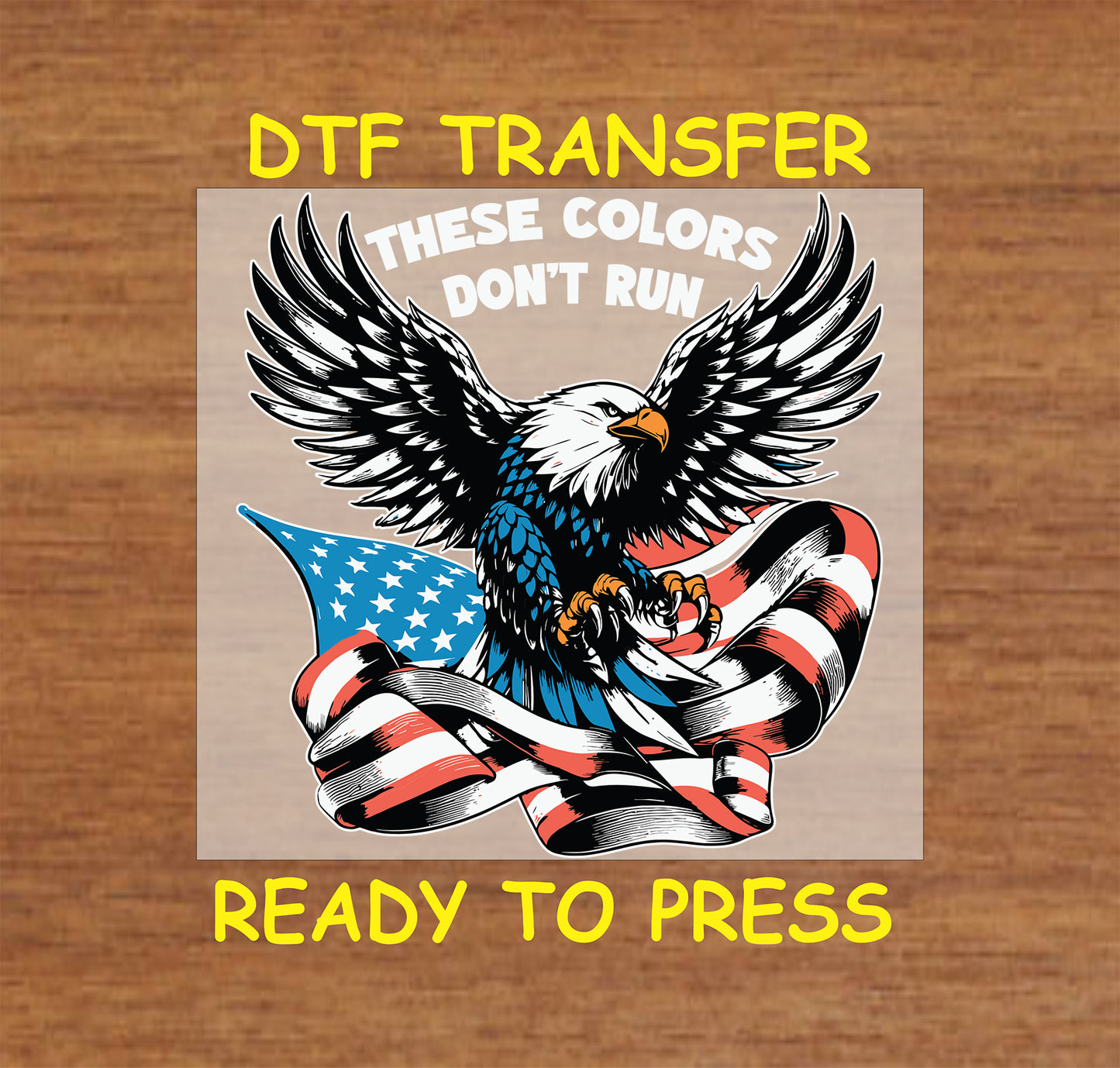 Bald eagle holding American flag with These Colors Don’t Run text above.