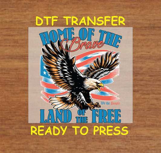 Flying eagle with waving USA flag and Home of the Brave Land of the Free text.