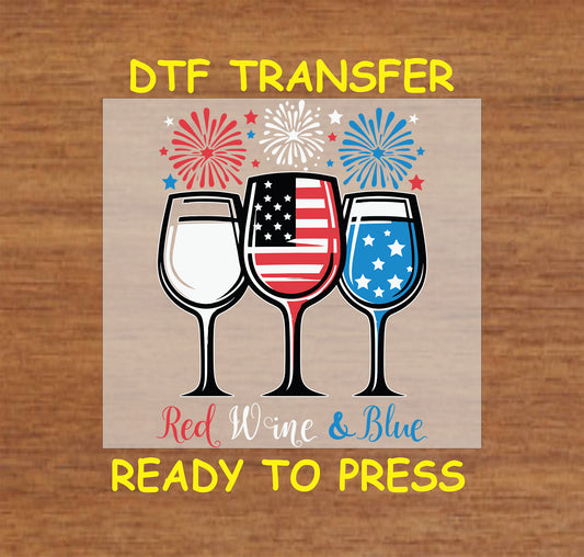 Three patriotic wine glasses with American flag patterns and fireworks above.