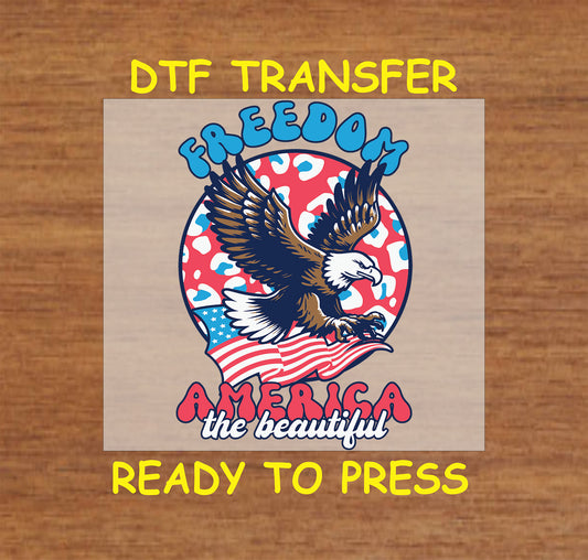 Eagle with American flag and cheetah print background with text Freedom America the Beautiful.