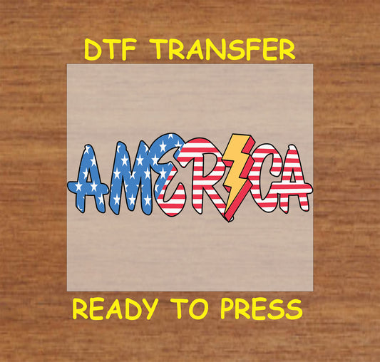 DTF transfer of the word America with stars, stripes, and a yellow lightning bolt.