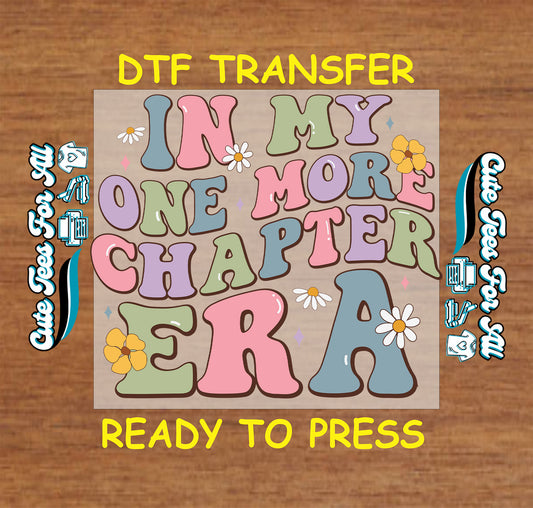 In My One More Chapter Era DTF transfer with pastel letters and daisies.