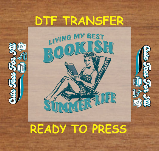 Living My Best Bookish Summer Life DTF transfer with retro woman reading on beach chair.