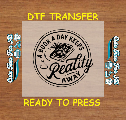 A Book a Day Keeps Reality Away DTF transfer with a cozy book theme.