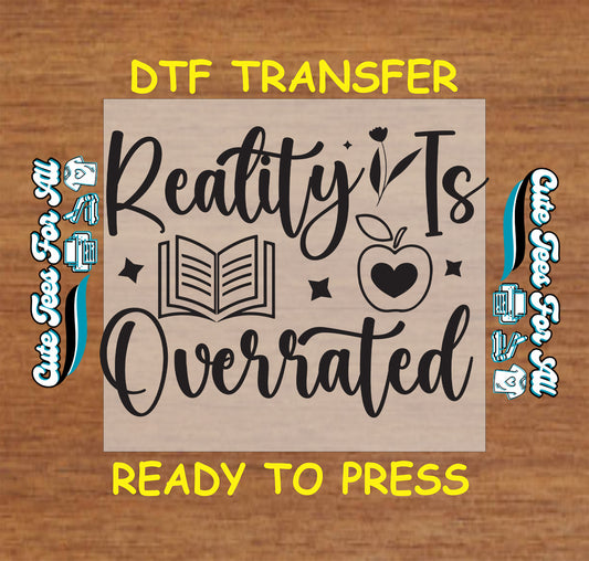 Reality Is Overrated DTF transfer with book, apple, and floral accents.