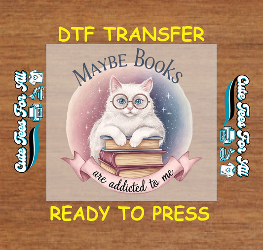 White cat with glasses sitting on books and quote “Maybe Books Are Addicted to Me.”