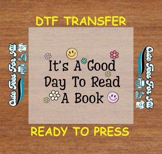 DTF transfer with “It’s A Good Day To Read A Book” text and colorful smiley flowers.