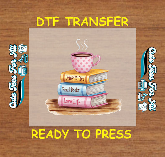 DTF transfer with coffee mug on stacked books labeled drink coffee, read books, love life.