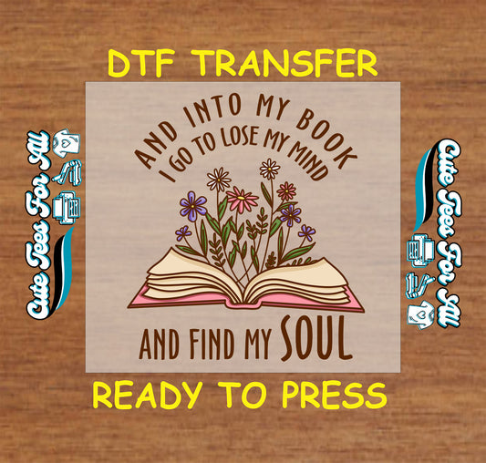 DTF transfer with floral open book and quote “And into my book I go to lose my mind and find my soul”
