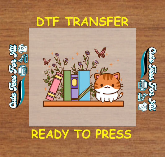 DTF transfer with bookshelf, flowers, butterflies, and an orange tabby cat.