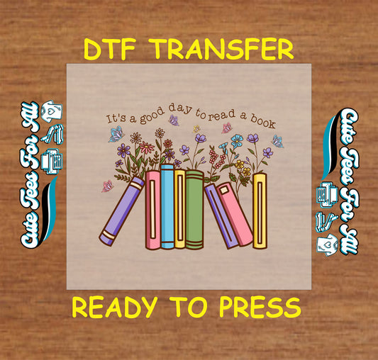 DTF transfer with pastel books, wildflowers, butterflies, and “It’s a good day to read a book” quote.