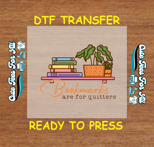 DTF transfer with books and plants and quote saying "Bookmarks are for quitters"