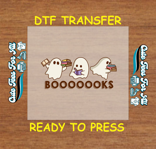 DTF transfer with three cartoon ghosts holding books and text that says “BOOOOOKS”