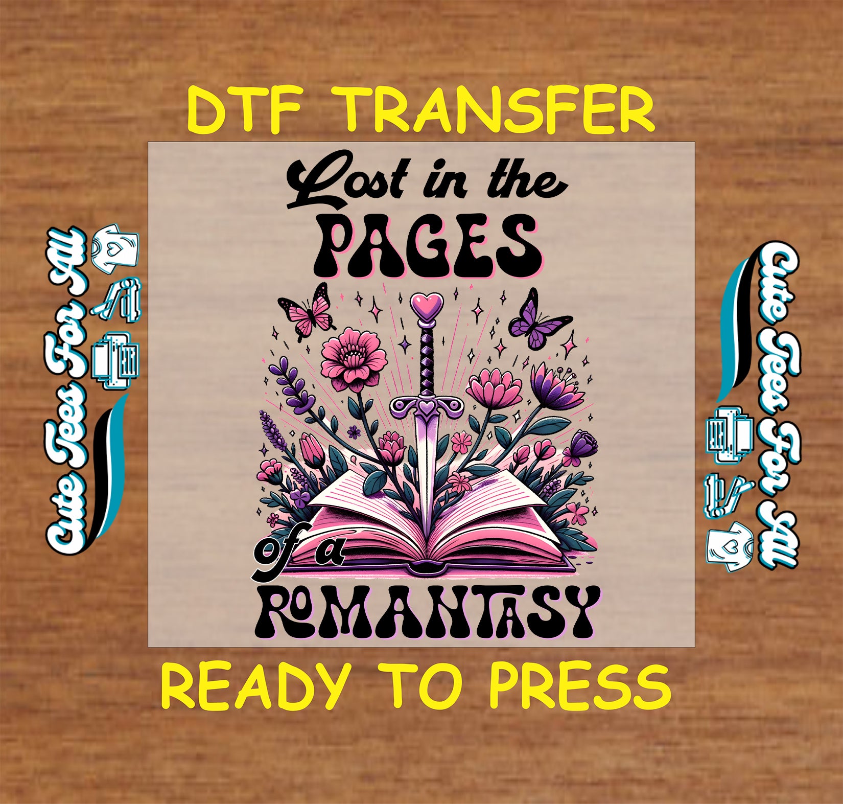 DTF transfer of an open book with sword, pink flowers, and text “Lost in the Pages of a Romantasy”