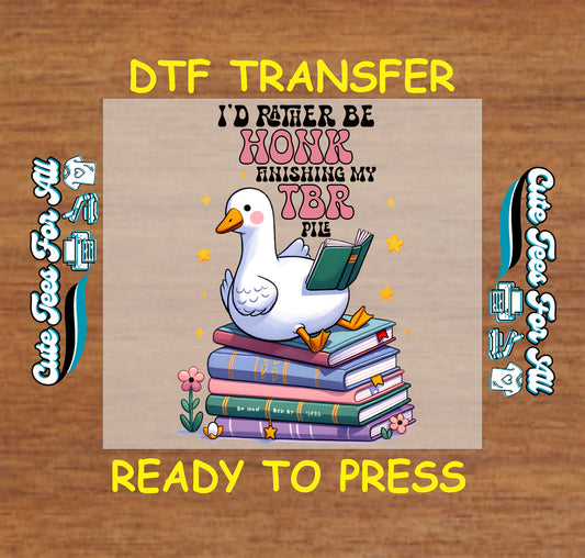 Funny goose sitting on book stack with phrase about TBR pile and reading