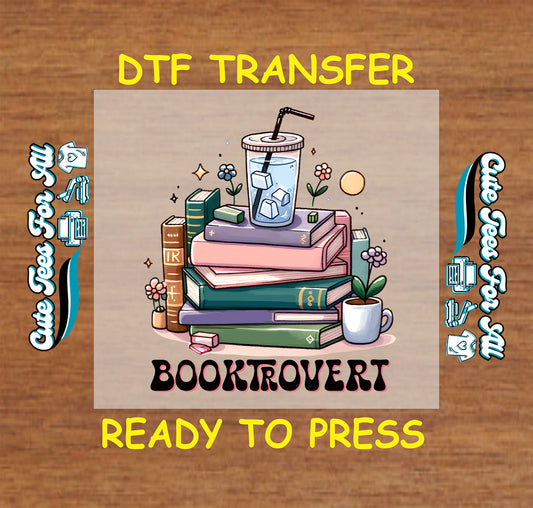 Stack of books with iced coffee, flowers, and the word Booktrovert underneath