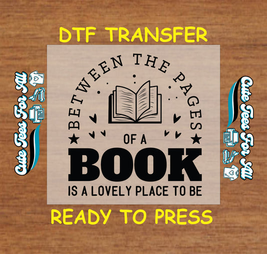 Open book DTF transfer with quote and decorative hearts and stars.