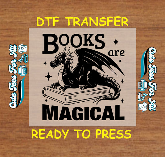 DTF transfer with black dragon sitting on a book and “Books Are Magical” quote.