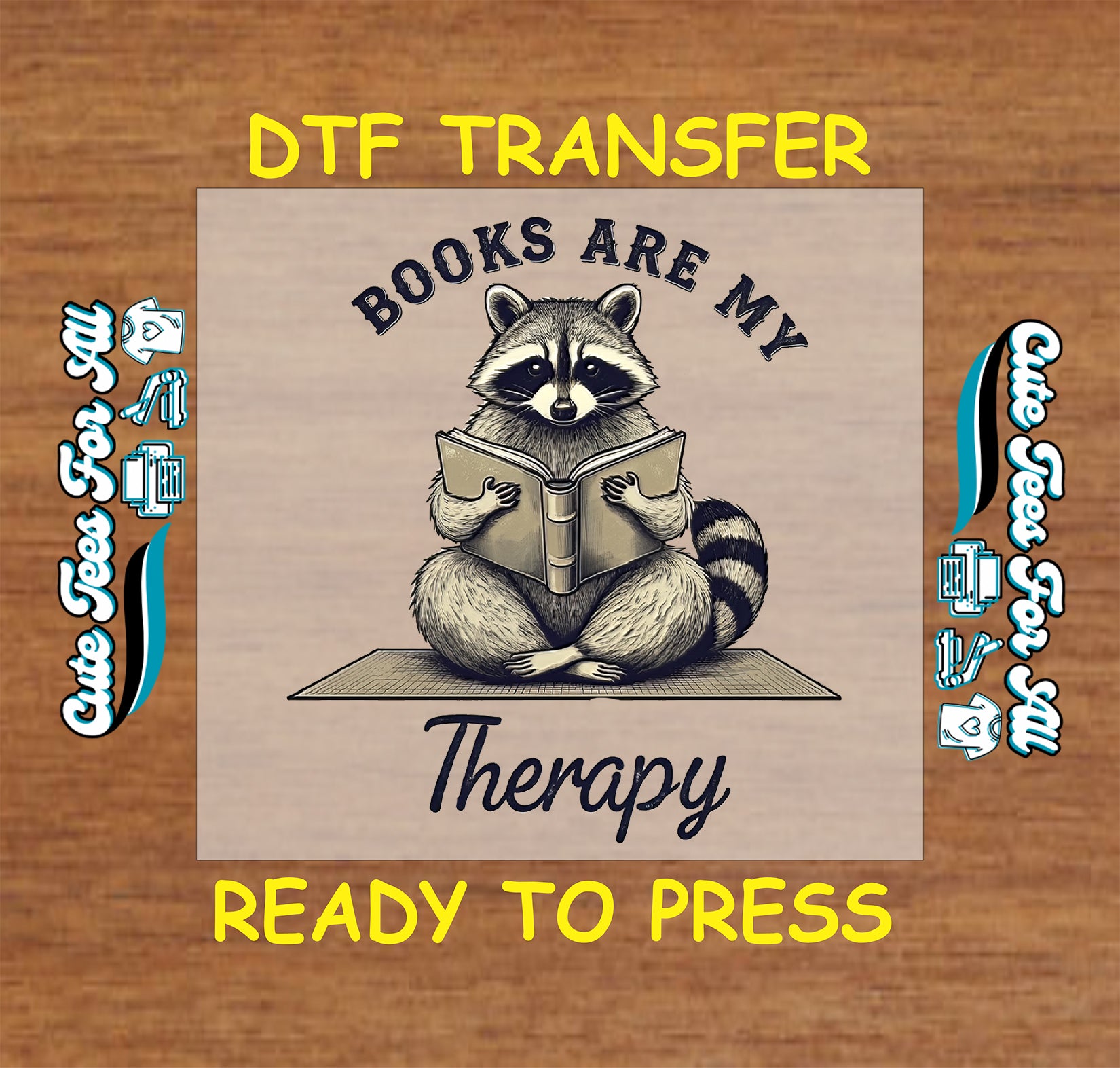DTF transfer with raccoon sitting and reading a book with “Books Are My Therapy” text.